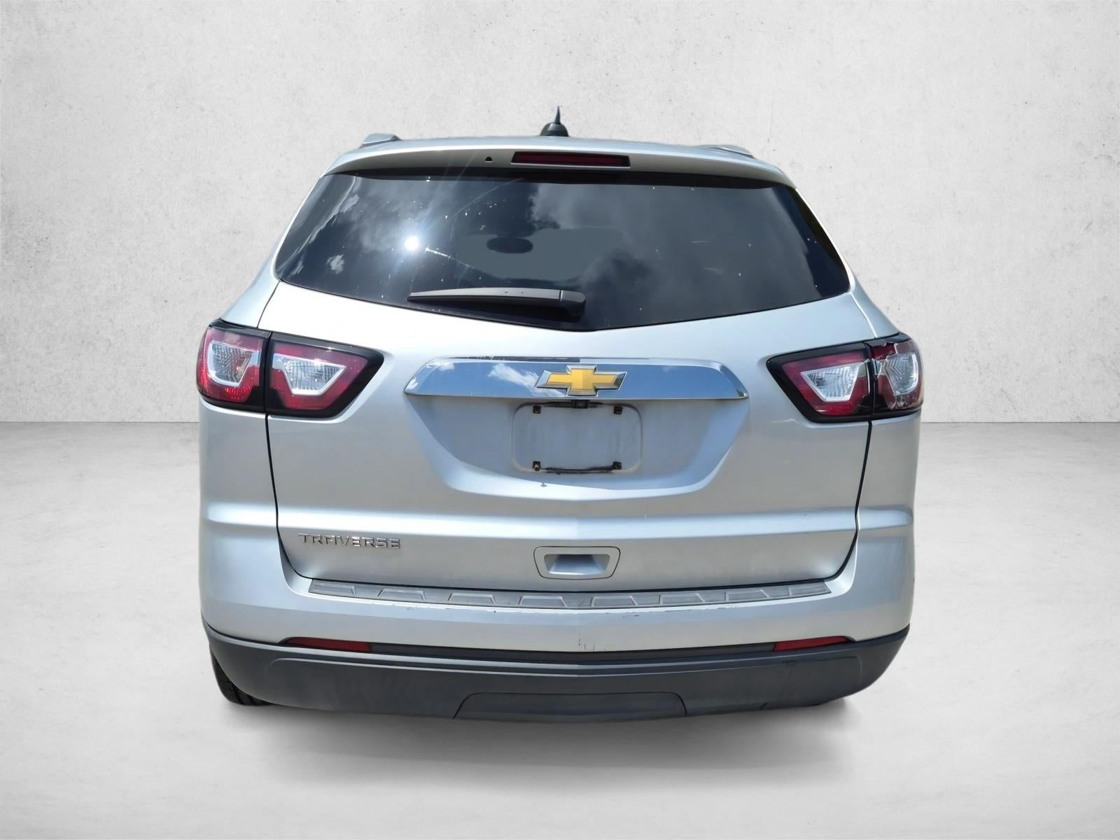Used 2017 Chevrolet Traverse LS with VIN 1GNKRFED3HJ345601 for sale in Greenacres, FL