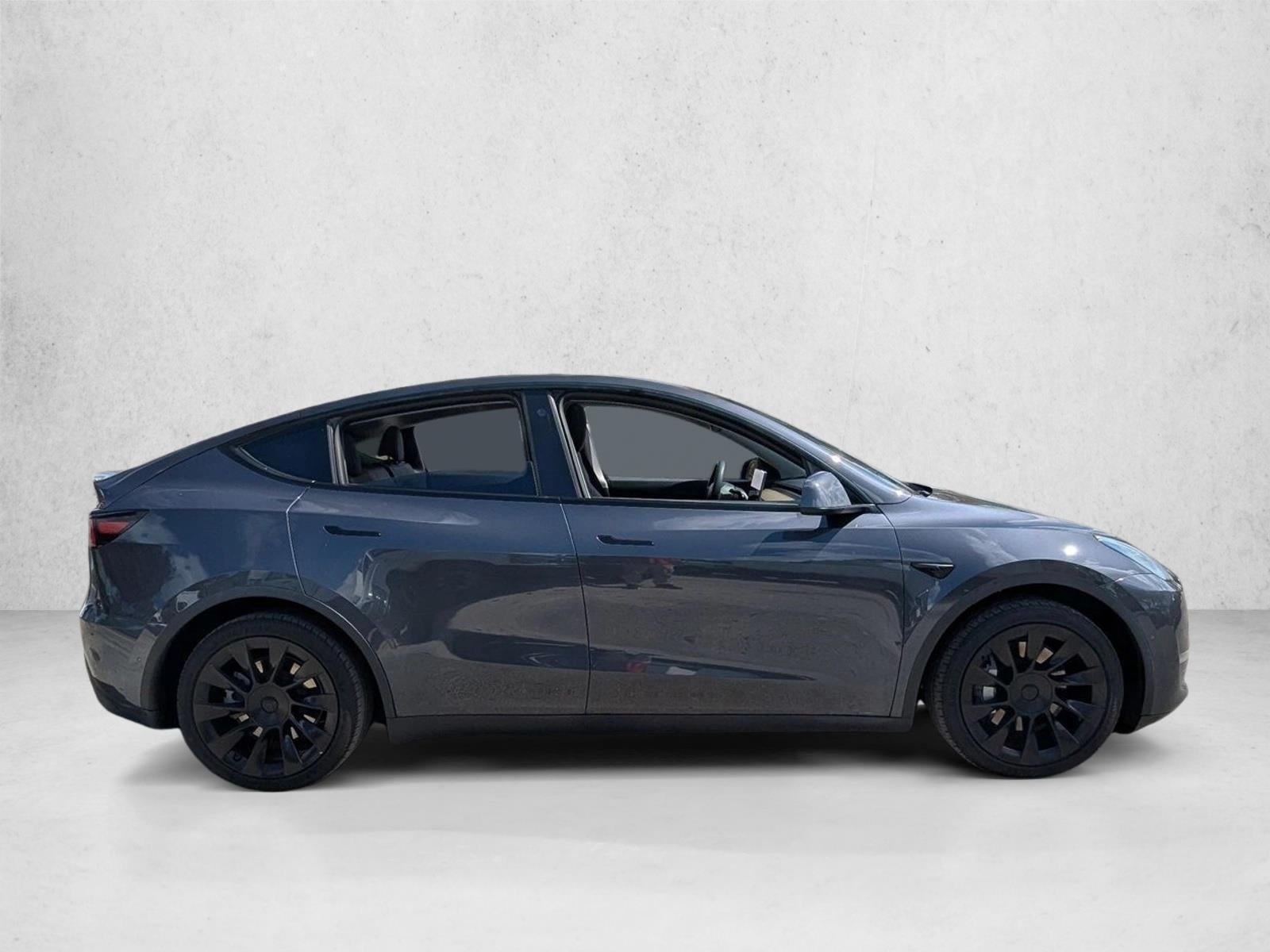 Used 2021 Tesla Model Y Long Range with VIN 5YJYGAEE2MF188309 for sale in Greenacres, FL