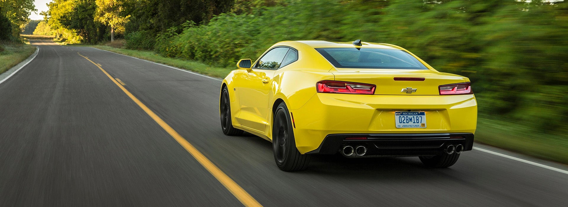 AutoNation Chevrolet Greenacres in Greenacres FL Chevrolet Camaro driving on a road