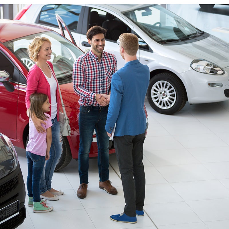 AutoNation Chevrolet Greenacres in Greenacres FL family looking at a new Chevrolet