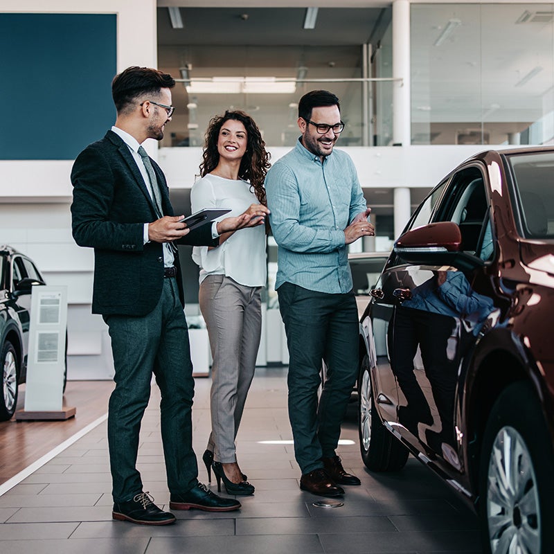 AutoNation Chevrolet Greenacres in Greenacres FL couple looking at new cars