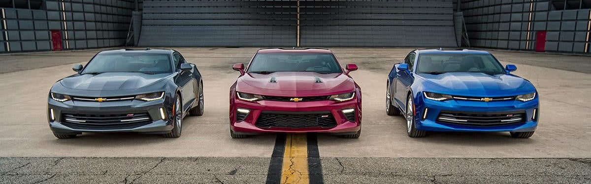 AutoNation Chevrolet Greenacres in Greenacres FL three Camaros parked